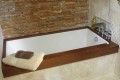 Andrea 17 Bathtub Installed as an Undermount, Wood Top