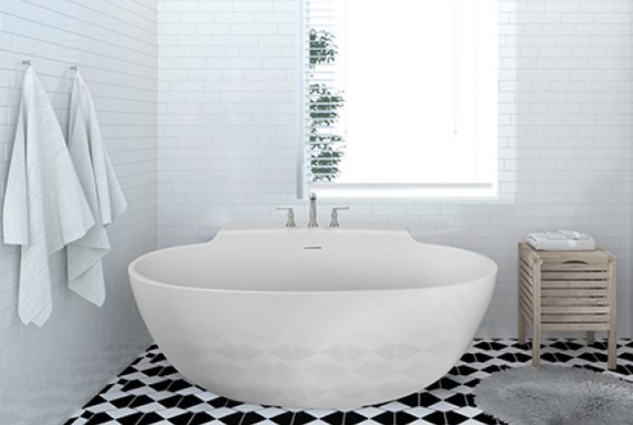 Freestanding Oval Bath with Curving Sides, Extended Deck with Faucets Installed