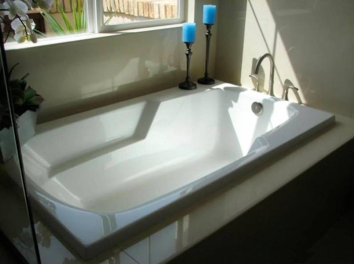 Solo Soaking Bath Installed as a Drop-in Tub, Modern Armrests
