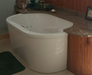Oval Freestanding Whirlpool with Partial Surround