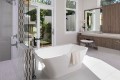 Addison 221 Bathtub Installed with Freestanding Tub Filler on the Tub End