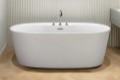 Oval Freestanding Bath with Angled Sides, Flat Overlapping Rim, Faucets in Deck
