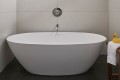 Alissa 249 Bathtub Installed in an Alcove with a Wall Mounted Tub Faucet