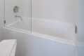 Cameron 4 Installed Between 3 Walls with a Wall Mounted Tub Faucet
