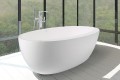 Oval Bath with Deck Area Wider on Side than the Other
