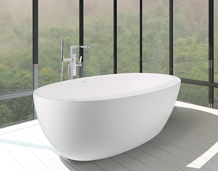 Freestanding Oval Bath with Deck Area Wider on Side than the Other