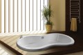 Eternity Shown as a Drop-in Tub, Deck mount Faucets
