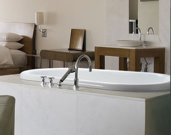 Laney 1 shown as a drop-in soaking tub in a freestanding surround