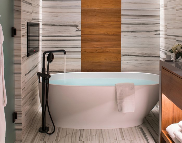 Oval Freestanding Bath with Recessed Base, Curving Backrest