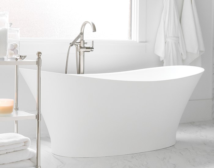Mallory Matte White Bath Installed with Freestanding Faucets
