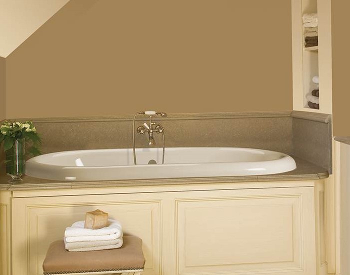 Melinda 9 Installed as a Drop-in, Traditional Surround with Wall Mounted Faucet