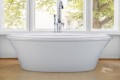 Victoria 4 Installed with Nodern Freestanding Faucet Centered Behind the Bath