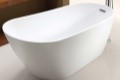 Oval Freestanding Tub with Raised Backrest and End Drain