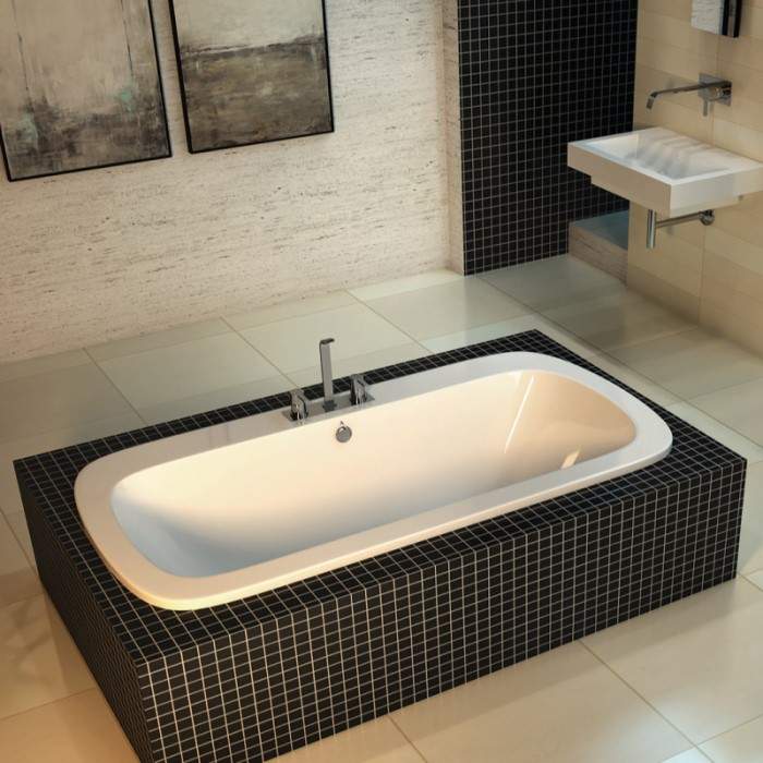 Anora Drop-in Soaker Tub Dropped into a Freestanding Tile Surround