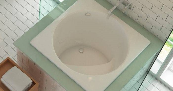 Beverly 4040 Drop-in Soaker Tub Installed in a Surround to Appear to be Freestanding