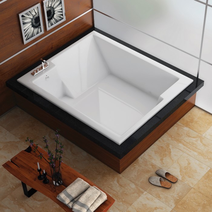 Confidence Drop-in Soaker Tub Installed in a Freestanding Wood Surround