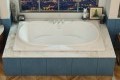 Icaro Bathtub Installed in a Tile Surround with Deck Mounted Faucet