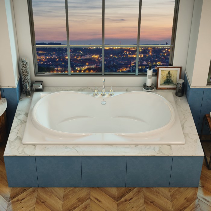 Icaro Bathtub Installed in a Tile Surround with Deck Mounted Faucet