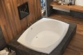 Malibu Soaker Tub Dropped into a Tile Freestanding Surround