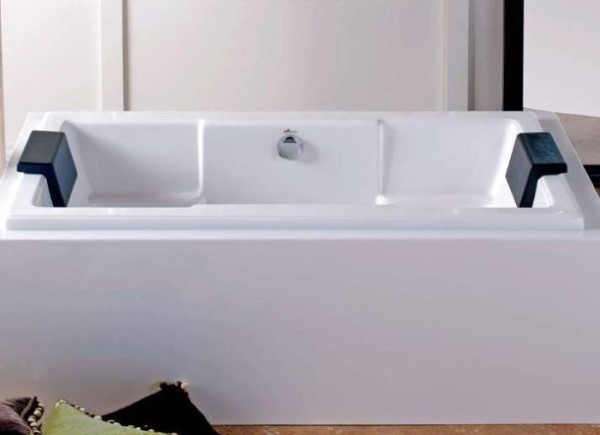 Quantum Rectangle Bathtub with Armrests, shown in White Surround