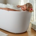 Oval Bath with Flat Rim, Shown with Bather