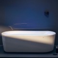 Contemporary Oval Freestanding Bath with Angled & Curving Sides