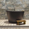 Oval Freestanding Bath, Shown in Black with Tray and Step