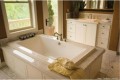 Angel Drop-in Bath Installed in a 3 Sided Tile Surround