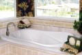 Cassi Drop-in Bath Installed in a Tile Surround with Steps