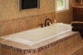 Charlotte Drop-in Bath Installed in a Tile Deck, Rim Mounted Faucet