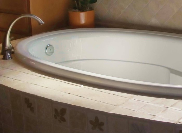 Riley Drop-in Tub Installed, Showing Decorative Rim and Interior Molding