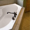 Rincon Corner Bath Installed as a Drop-in, Deck Mounted Faucets