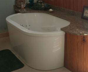 Oval Freestanding Whirlpool with Partial Surround