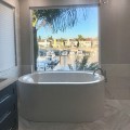 Oval Freestanding Tub with Wide, Flat Rim