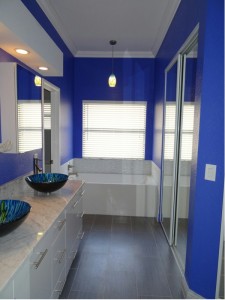 Blue and White Bathroom with Gray Floor