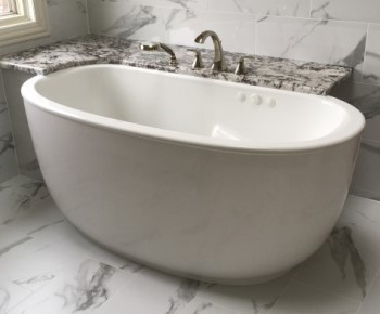 Freestanding Bath with Shelf for Faucets