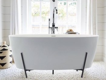 Solid Surface Freestanding Bath in a Metal Cradle
